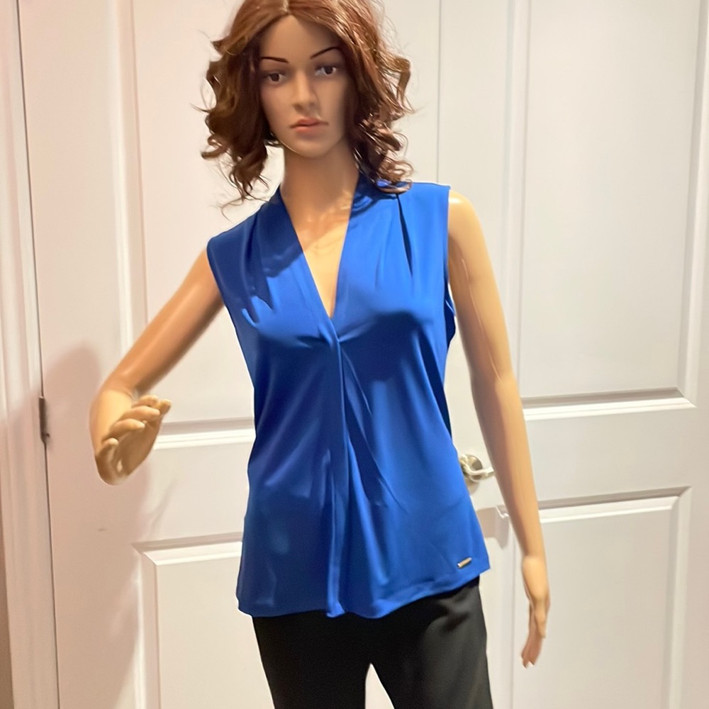 Calvin Klein sleeveless blouse. NWT small.